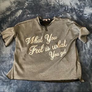 “What you feel is what you get” ruffle sleeved crop top